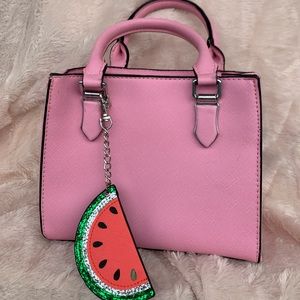 Watermelon crossbody faux leather handbag by Ardene. Color: pink.